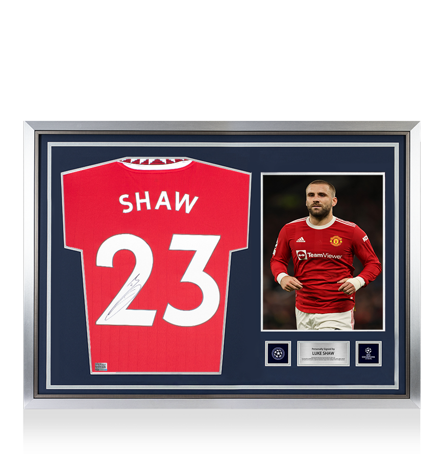 Luke Shaw Official UEFA Champions League Back Signed and Hero Framed Manchester United 2022-23 Home Shirt with Fan Style Numbers UEFA Club Competitions Online Store
